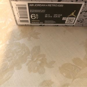 Air Jordan retro 4 size 6.5 brand new in the box slight color on the inside